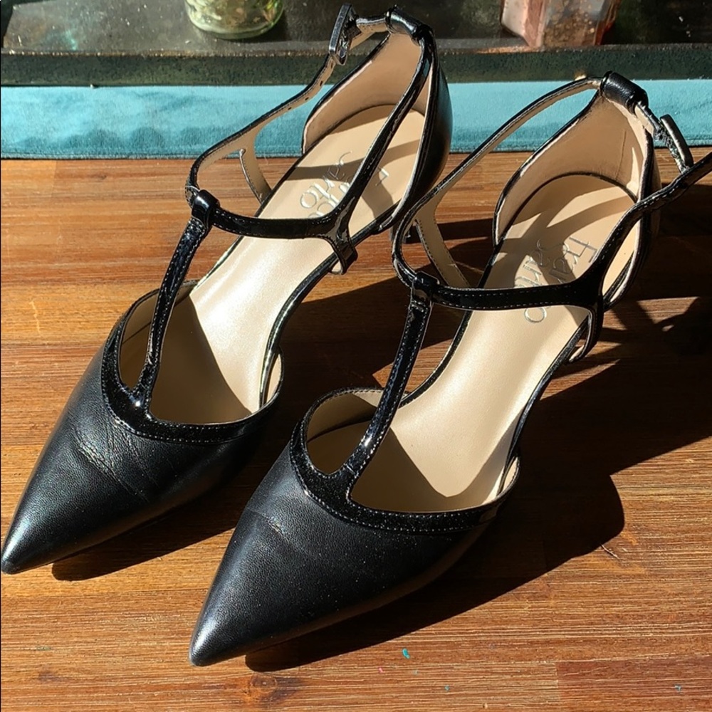 Strapping black heels.